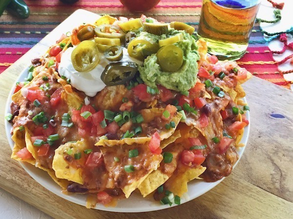 Restaurants begin serving “Loaded Nachos” in the ‘90s.