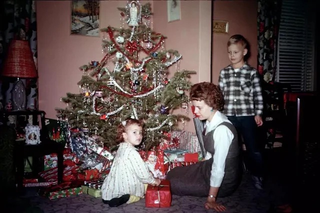 A family on Christmas morning in the 1950s.