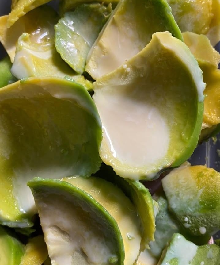 Sweet condensed milk on avocado.