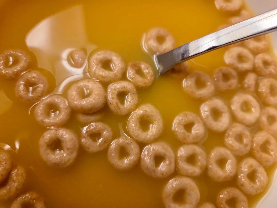 Cereal with orange juice.