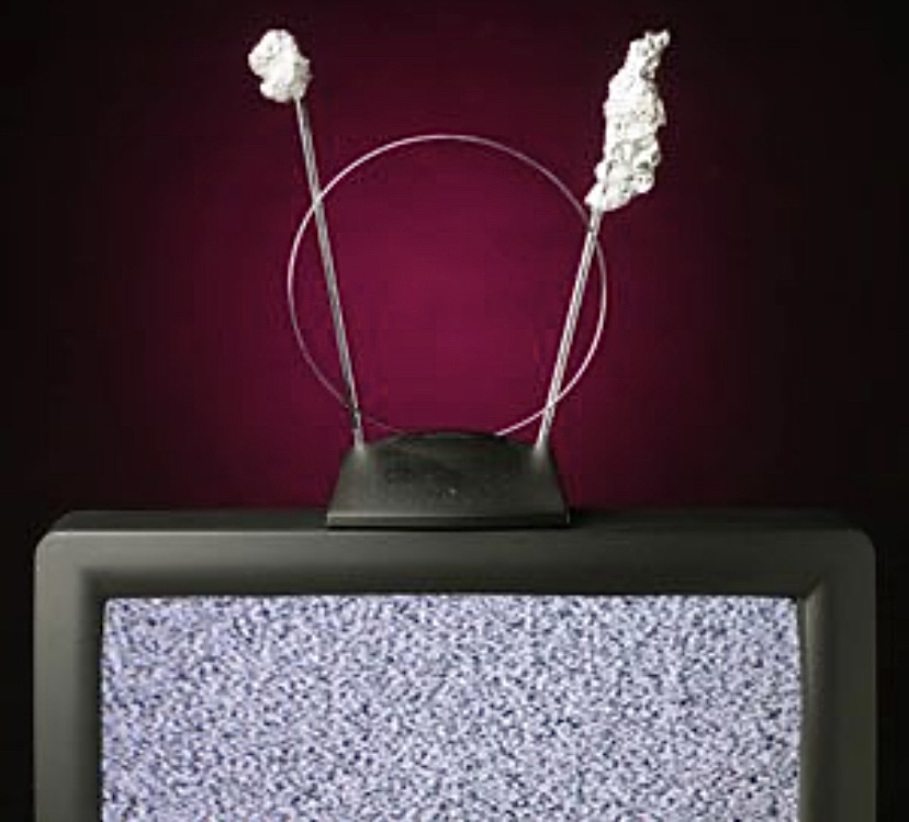 Putting Foil on the Rabbit Ears for Better Reception