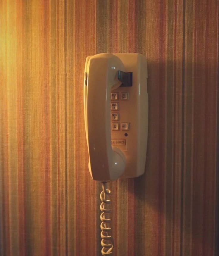 The Whole Family Shared One Phone… On the Wall… With a Cord