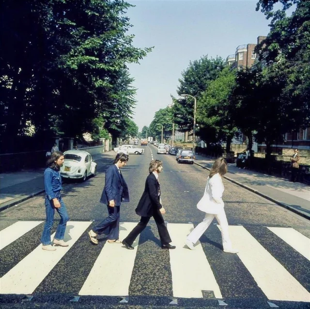 The Beatles crossing Abbey Road, 1969.