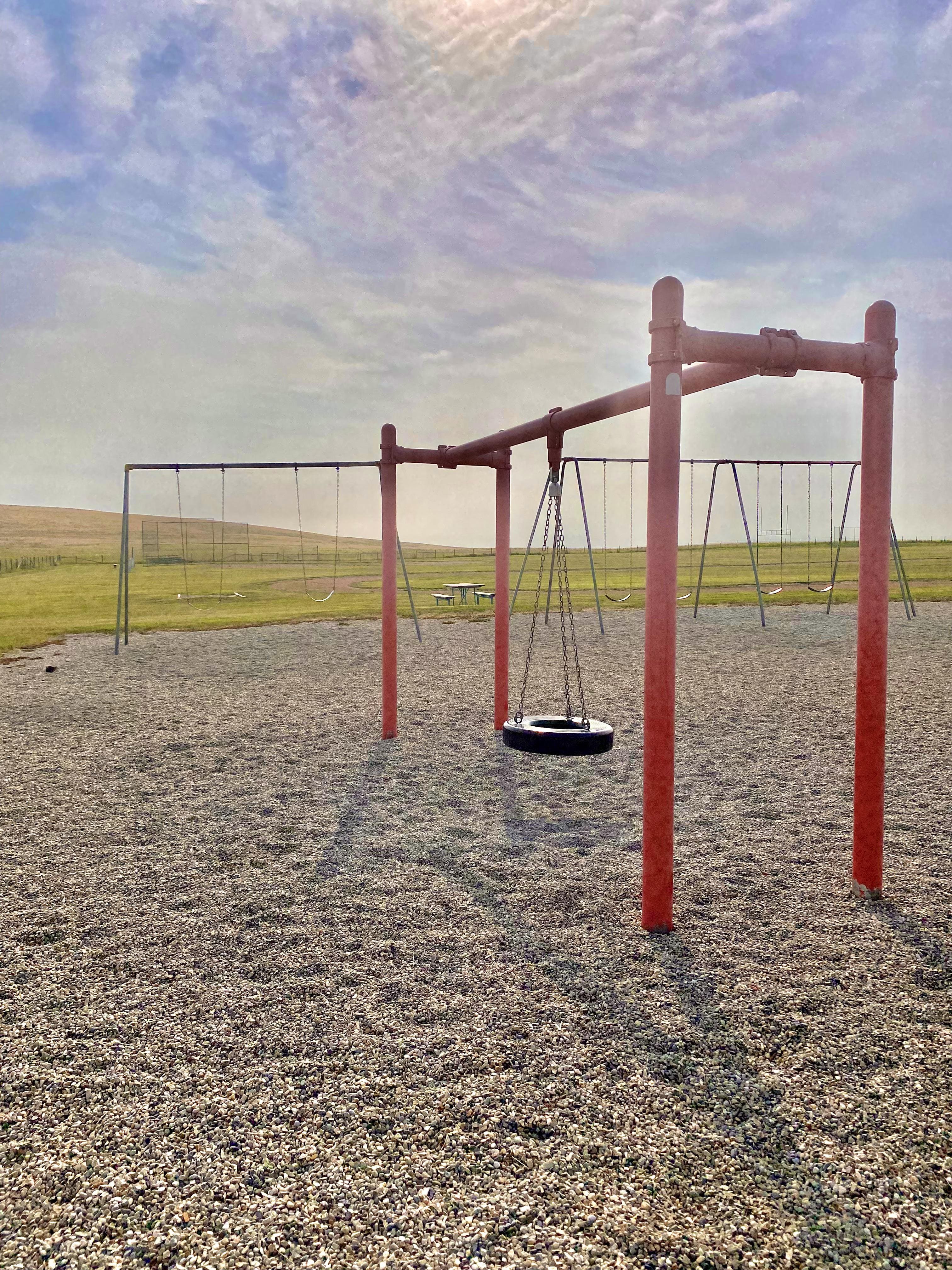 Forgotten laughter haunts the playground.