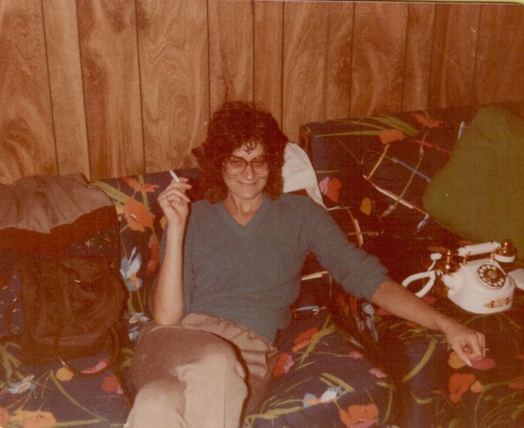 Couch. Cigarette. Sunglasses. 70s.