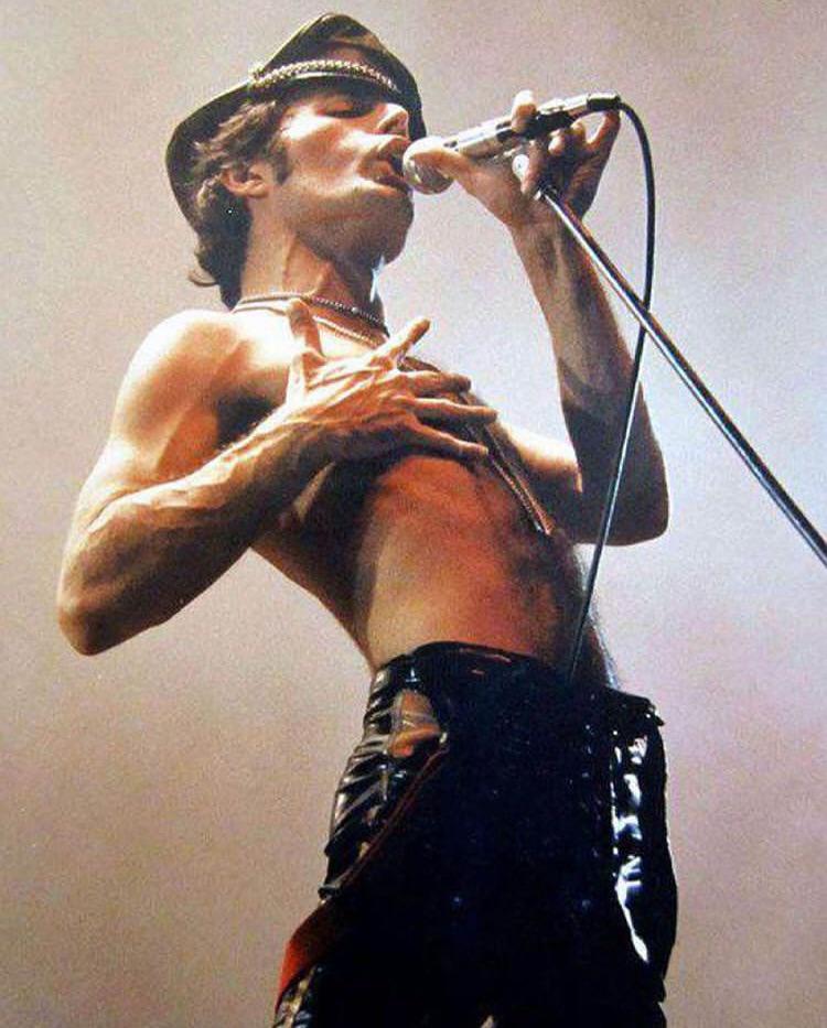 Freddie Mercury in leather and stage power.