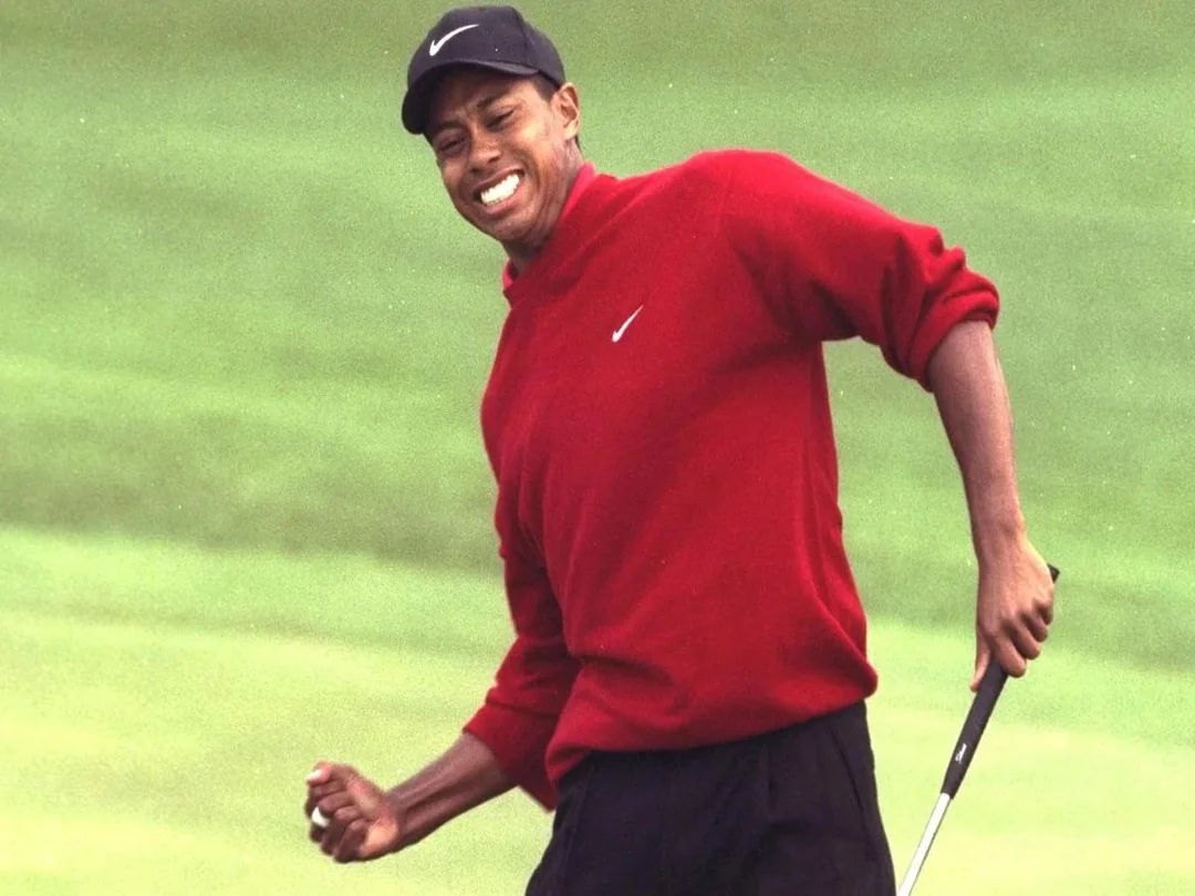 Tiger Woods' first masters, prodigy behavior.