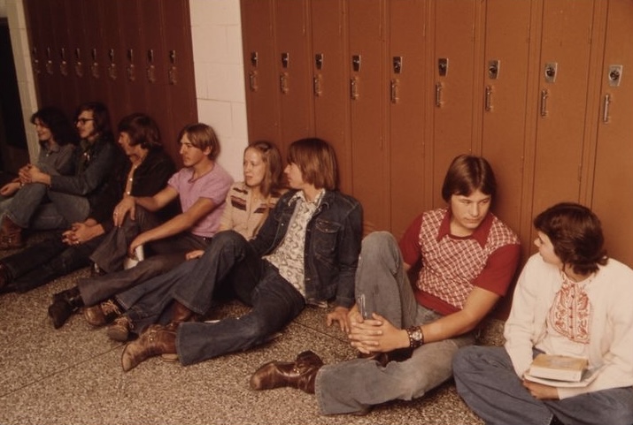 Teens by the Lockers, Solving the World’s Problems (Or Gossiping)