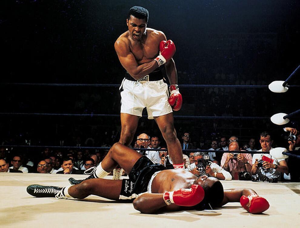 Muhammad Ali standing over Sonny Liston in 1965.