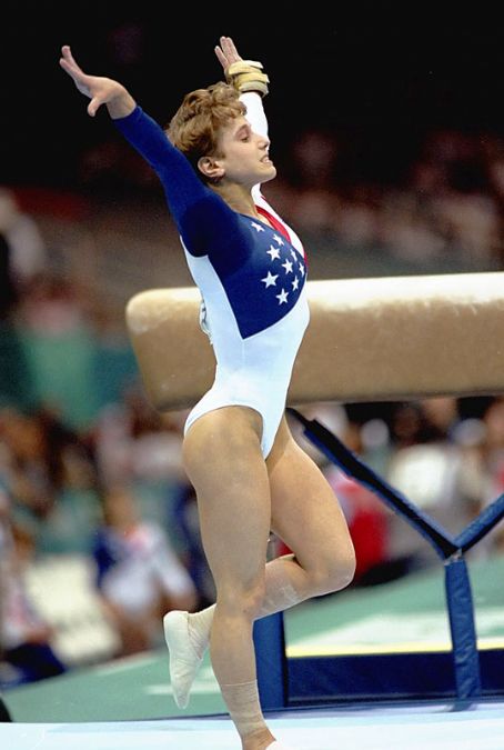 Kerri Strug landing on one foot in 1996 Olympics.