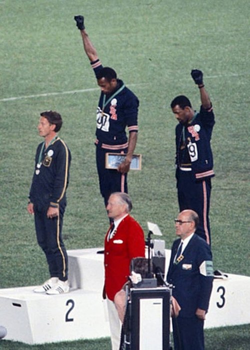 Tommie Smith & John Carlos' black power salute in 1968 Olympics.