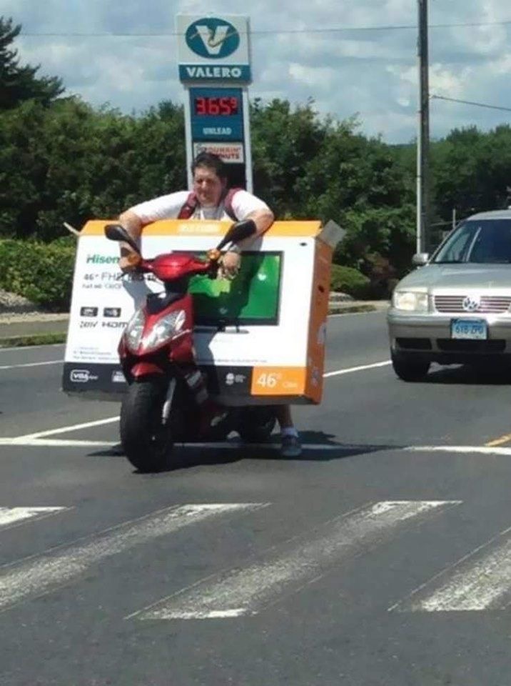 Man on Baby Bike, Hauling Big Dreams