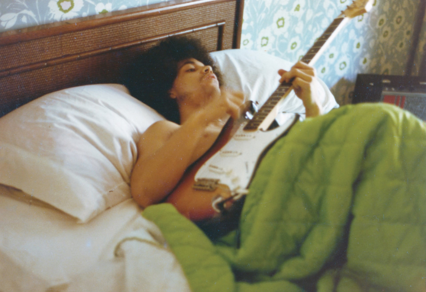 Prince: Shirtless, Bedridden, Electrified by a Guitar