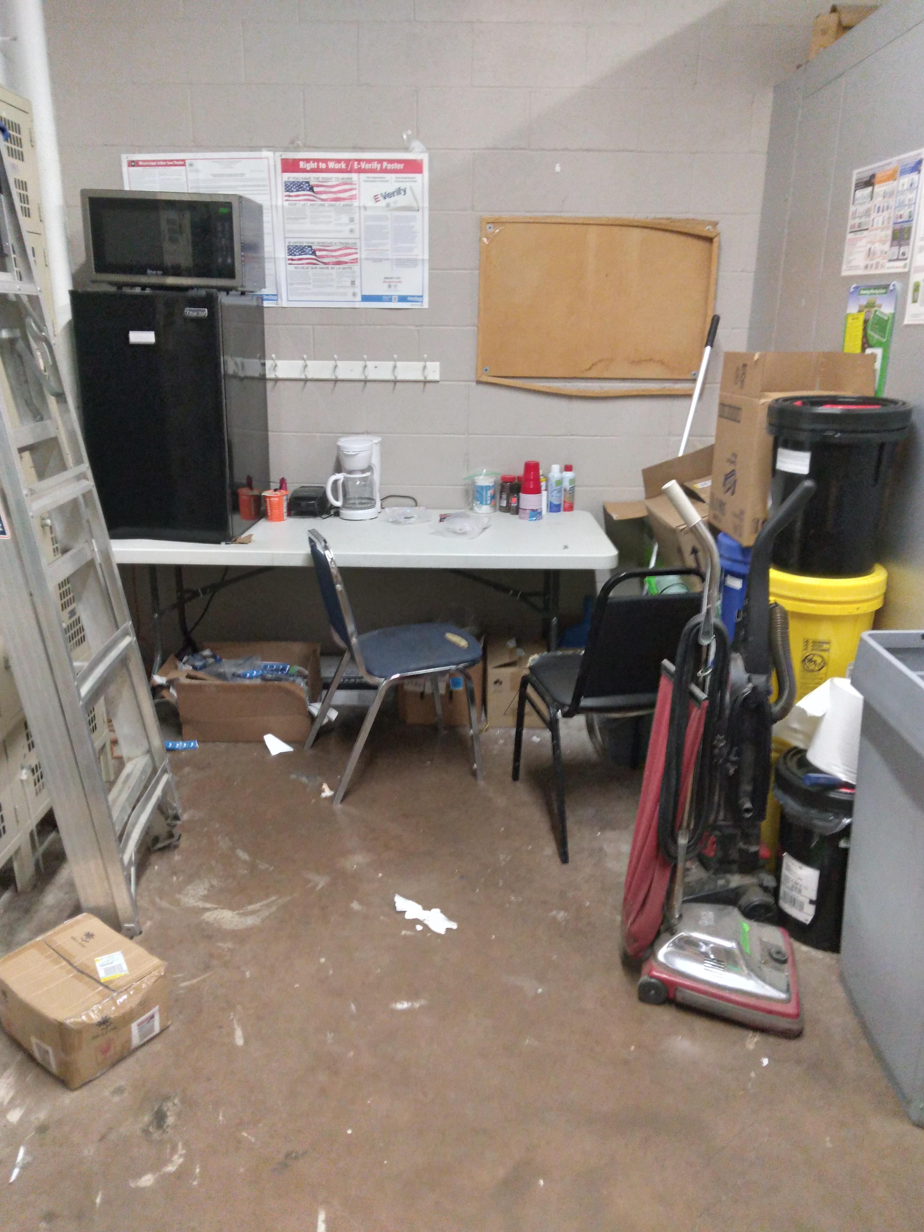 The trifecta of sadness; a chair, a microwave and a vacuum.