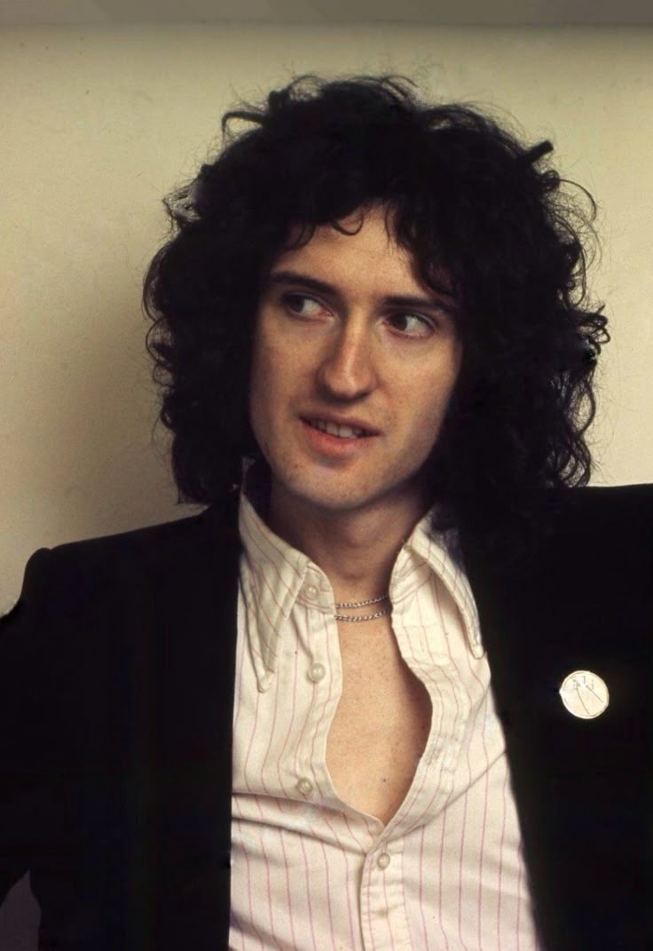 Brian May: PhD in Astrophysics