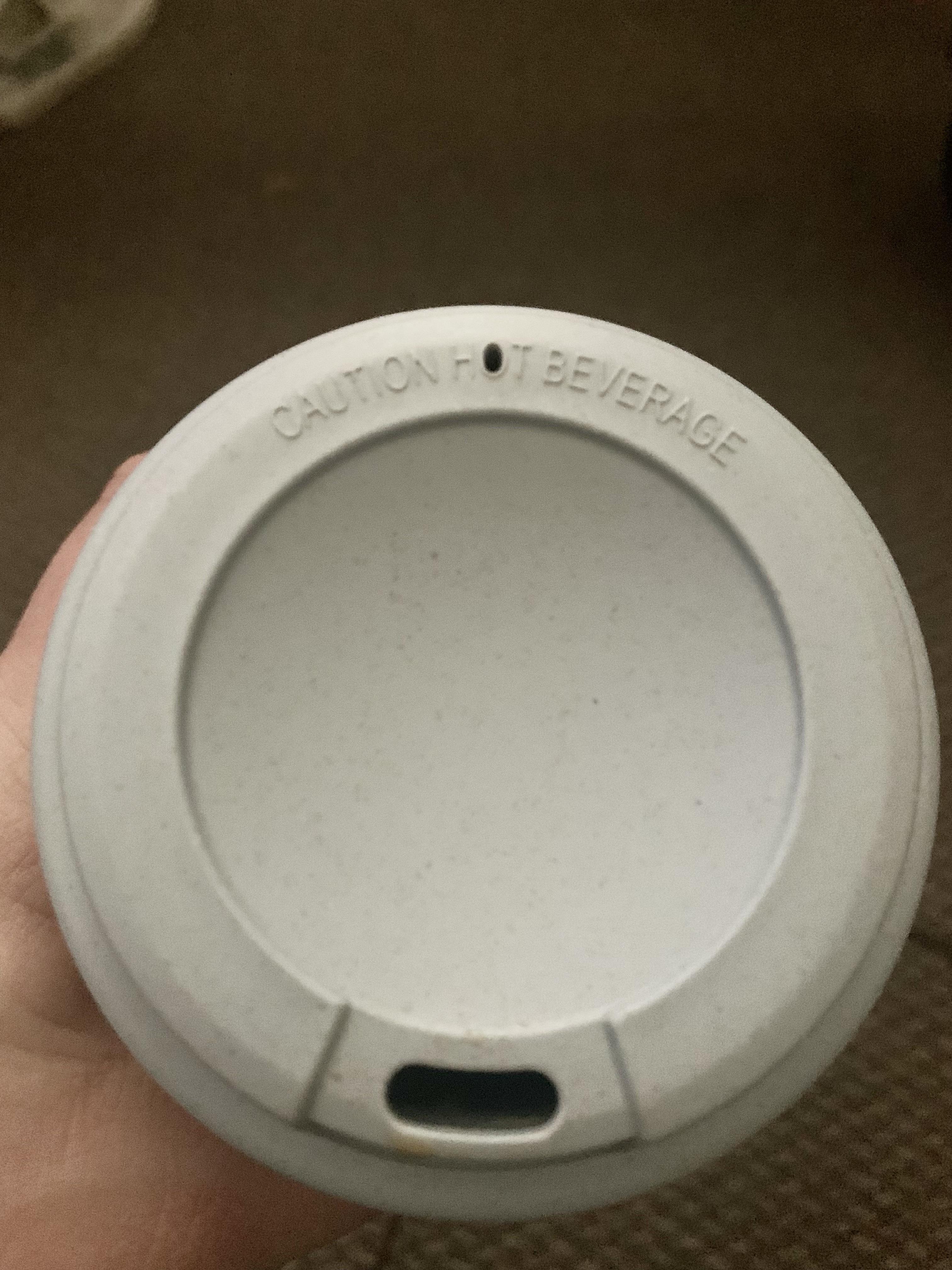 Ignoring the “hot lid” warning and grabbing it anyway.