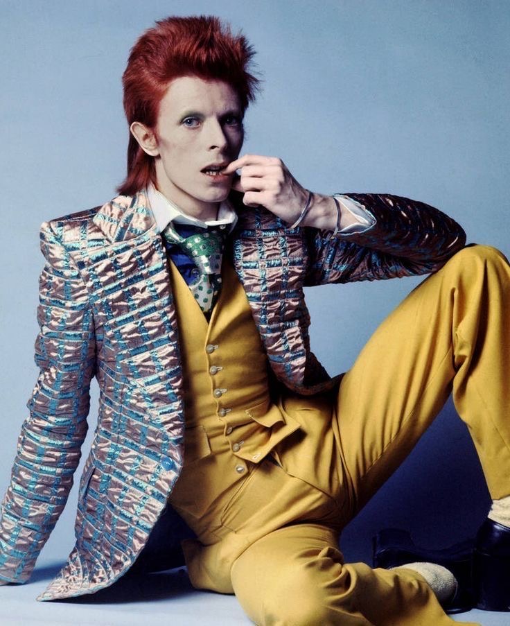 Mustard Pants. Vest. Glitter Jacket. Physics-Breaking Combo.