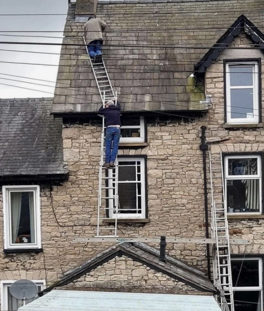 Two Men. Four Ladders. One Bad Idea.