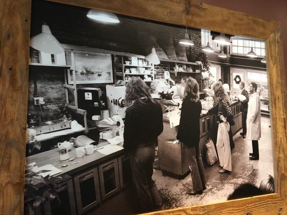 Inside those early shops, customers didn’t order lattes yet, they bought beans, grinders, and scoops of fresh-roasted coffee to brew at home.