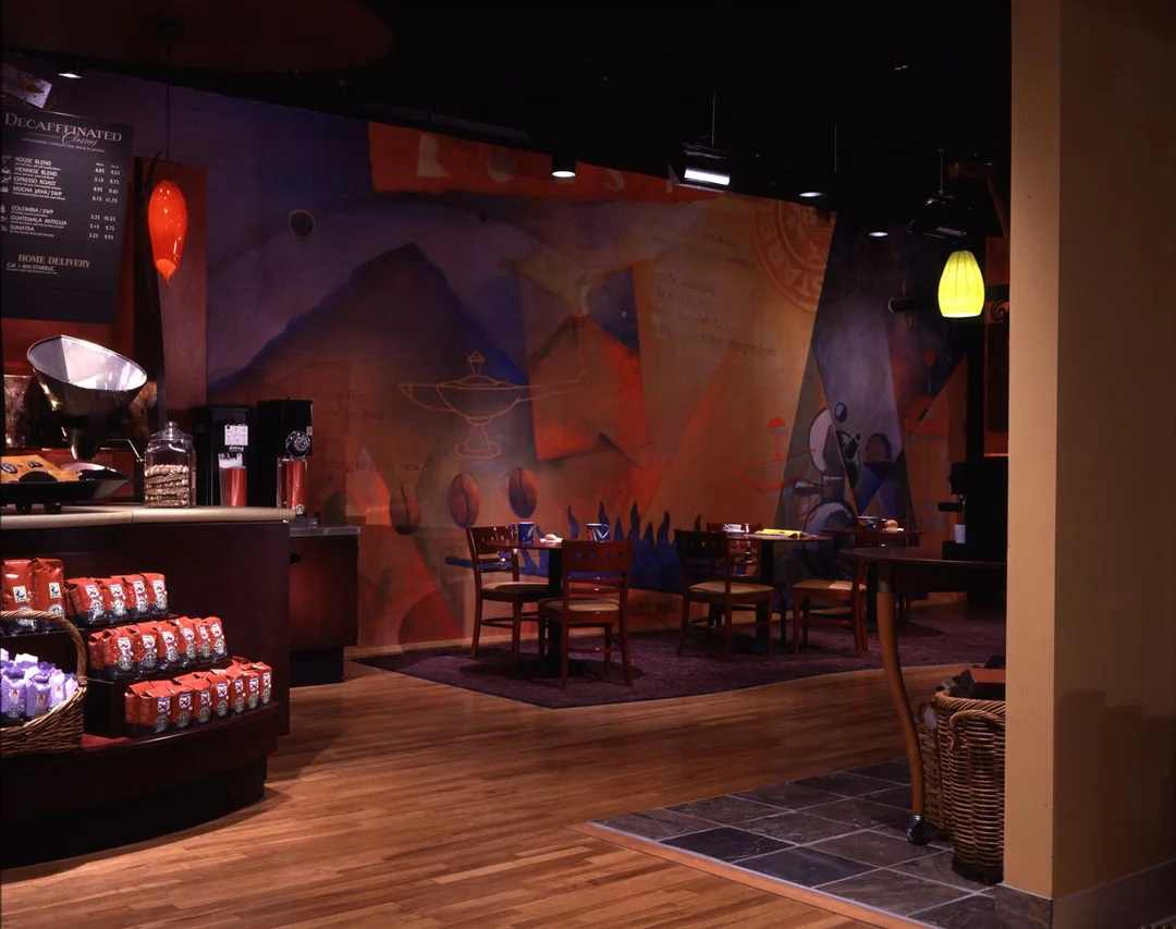 Starbucks’ look evolved, cozy seating, warm lighting, and menus that encouraged people to linger, sip, and socialize.