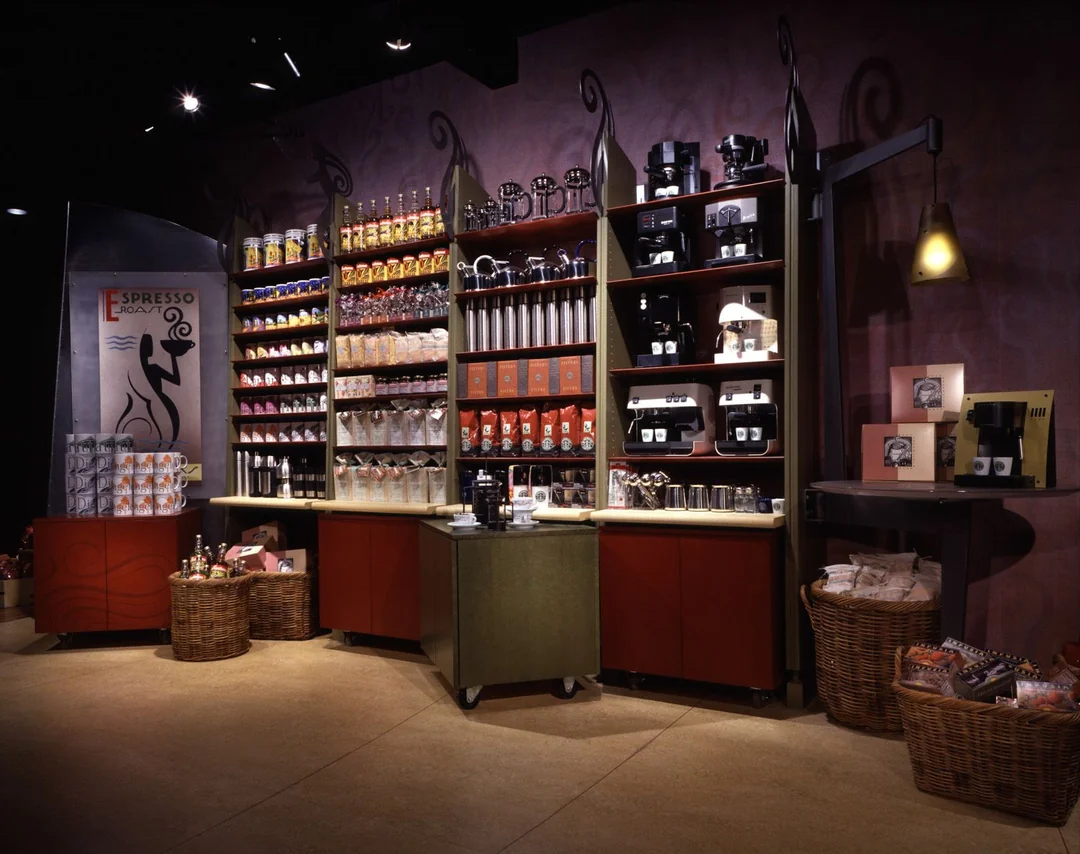 The late 90s stores had a distinctive vibe, earthy tones, abstract art, and those cozy armchairs that practically begged you to stay.