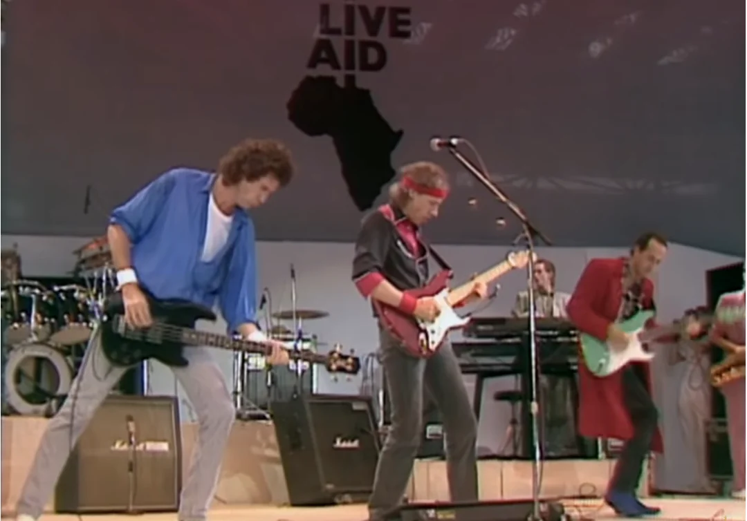 Dire Straits keeping it smooth in front of millions.
