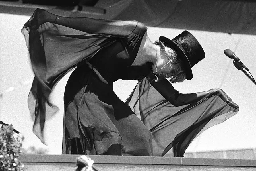 In 1977, under the sun in a top hat and chiffon, the witchy stage persona that became iconic.