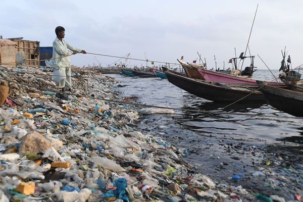 Dying Oceans: Fishermen Amidst Pollution and Overfishing