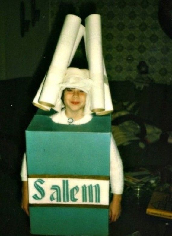 A Child. Dressed as a Pack of Cigarettes.
