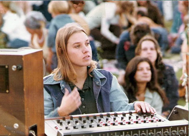 Turning knobs while having fun.