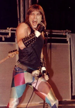Bruce in the iconic technicolor tights.