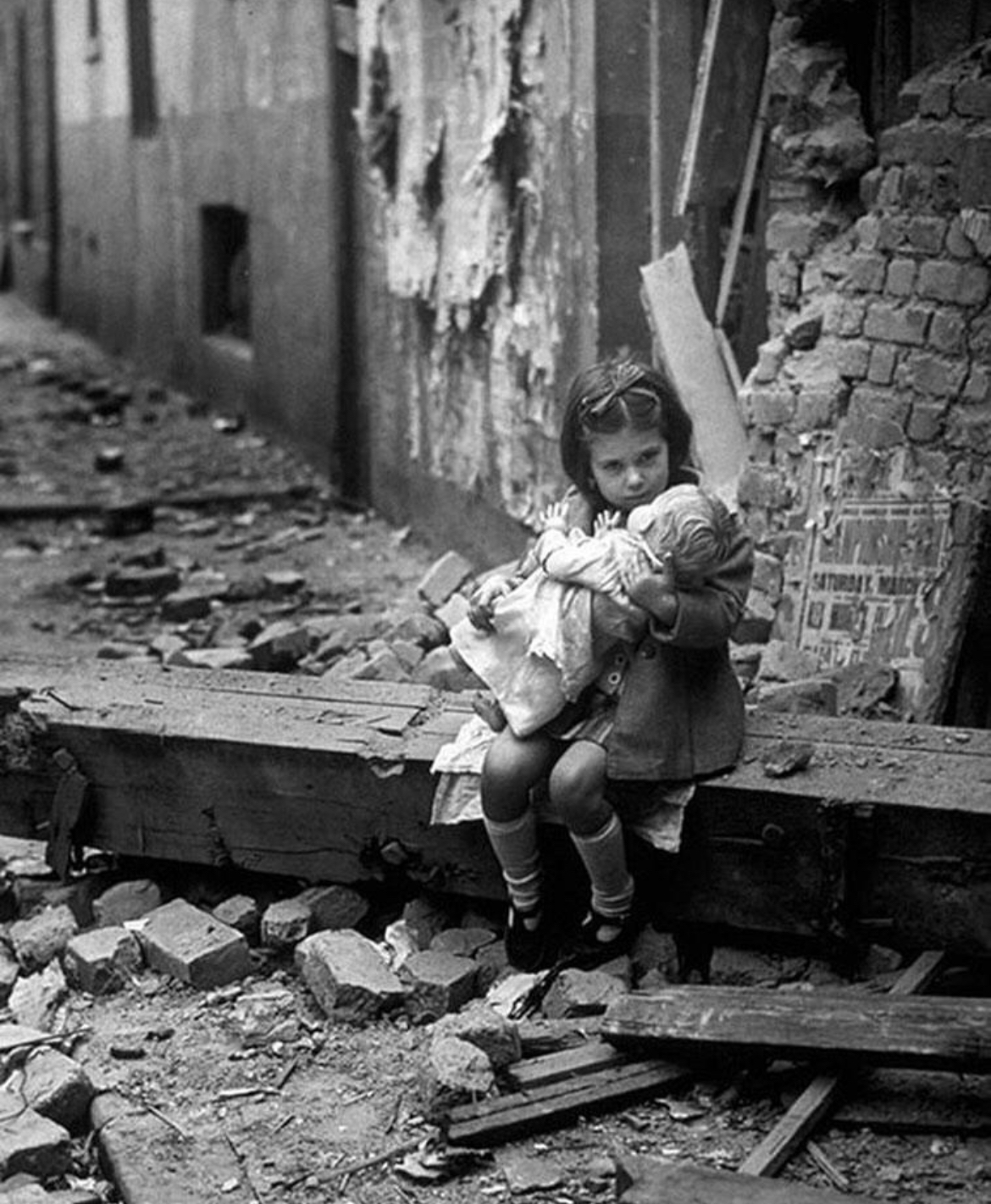 Hope Amid Rubble: A Child, a Doll, and a War