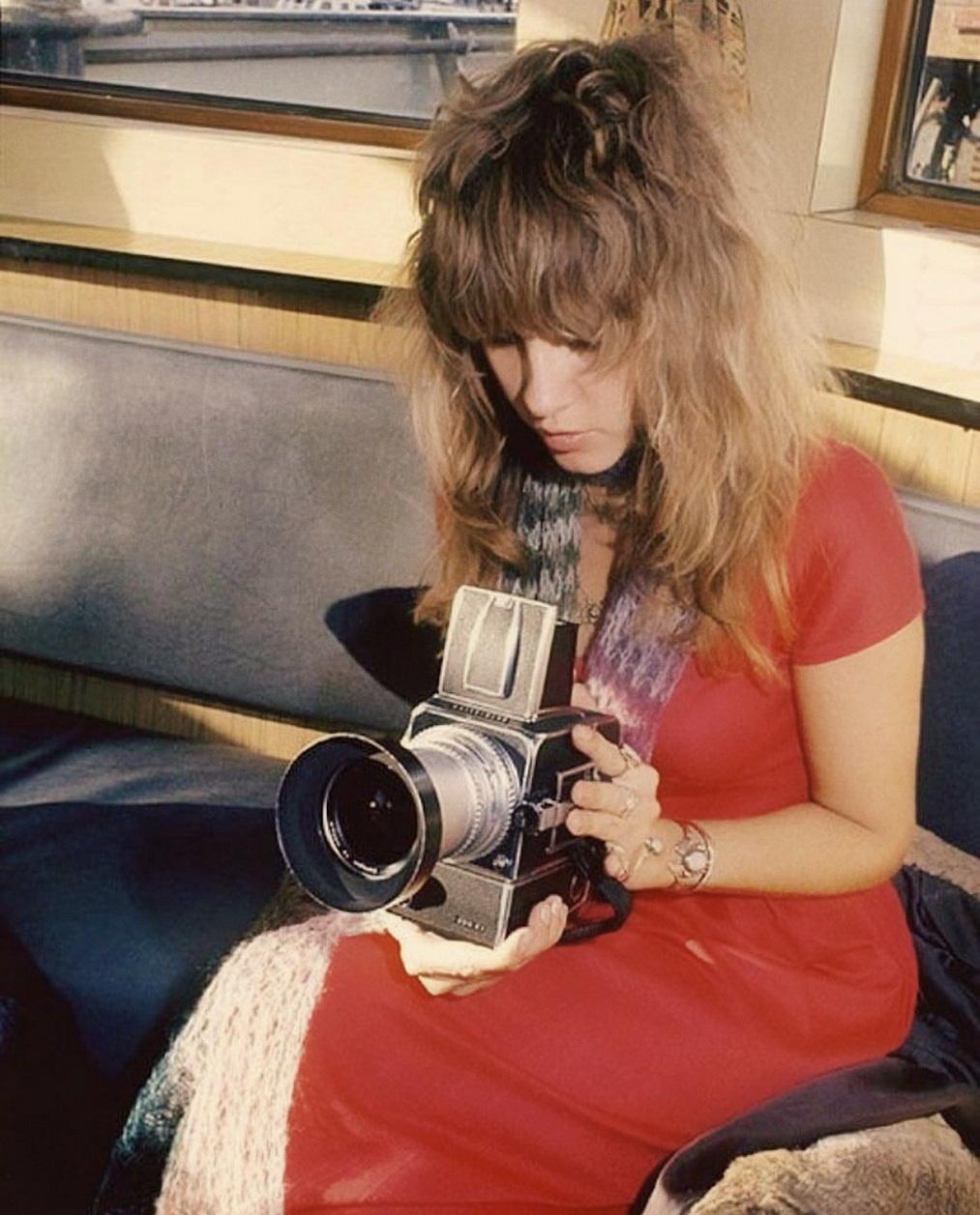 Capturing the world that always captures her.