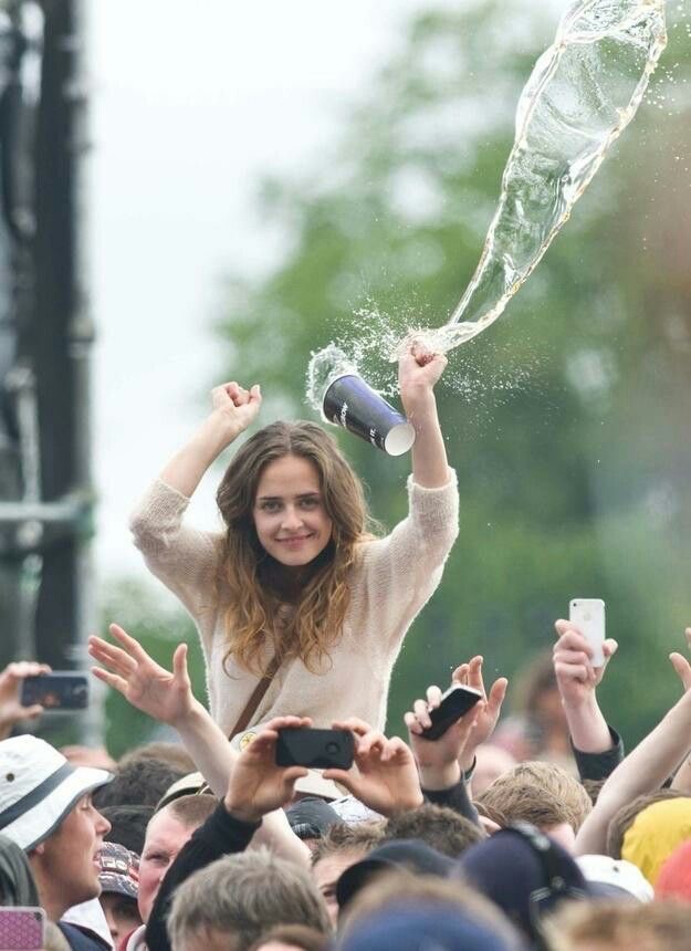 Girl vs. Flying Water Cup: The Splash is Coming