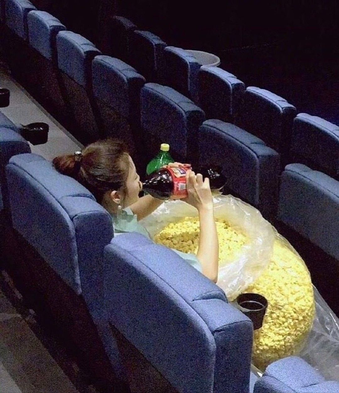 Cinematic Solitude: Popcorn, Soda & Loneliness