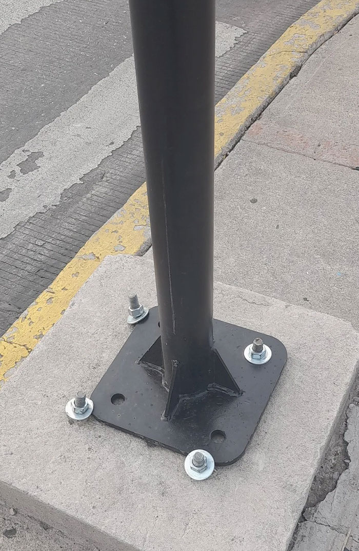 A lamppost secured with optimism.