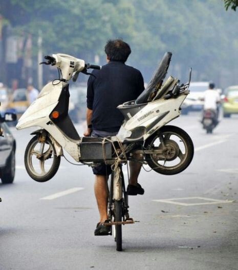 Bicycle Towing Motorcycle: Nature is Healing