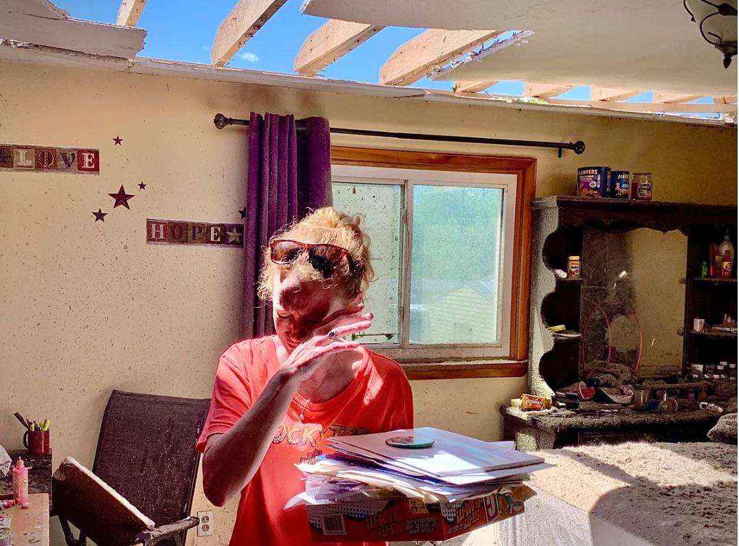 Dog with sunglasses or just a lady?