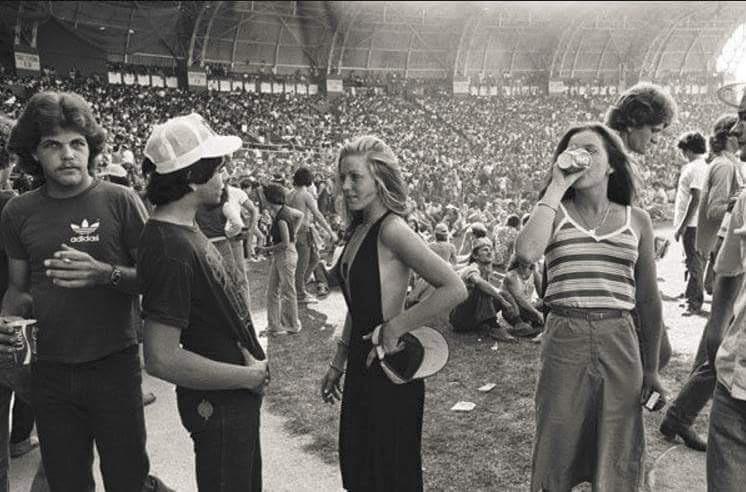 Candid moments at a Fleetwood Mac concert.