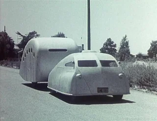 1950s vision of road trips, cool but claustrophobic.