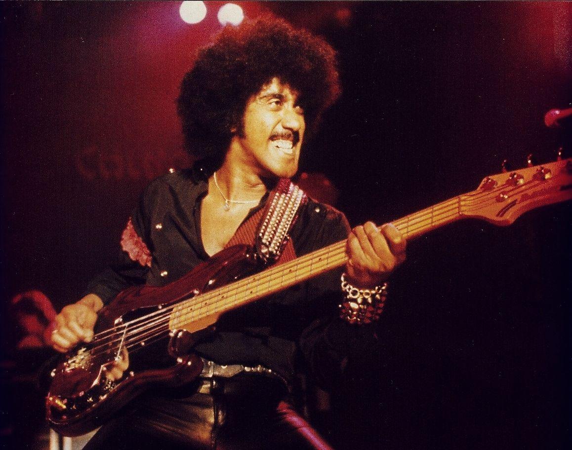 Phil Lynott in his prime, lighting up the arena.