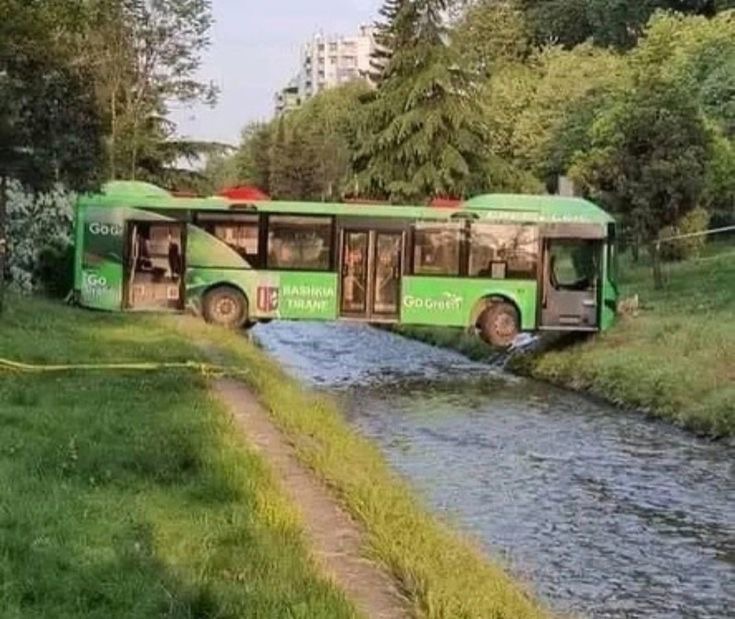 Bus Tries To Go Over River. River Wins.
