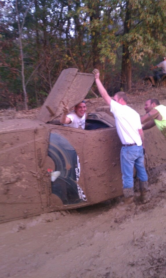 Car meets mud. Car loses fight.
