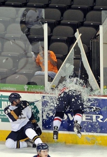 Hockey Player Smashes Glass Like a Rock Star Exit