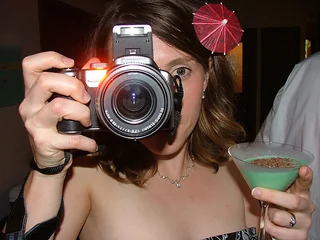 A martini and a camera? Icon of multitasking.