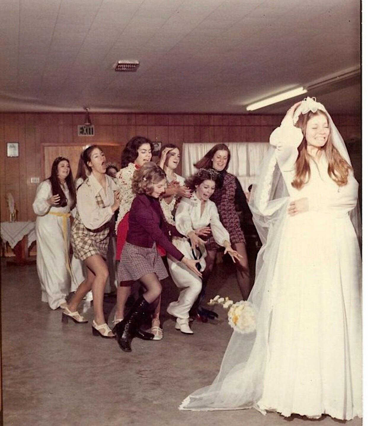 A bouquet toss in 1973, iconic.