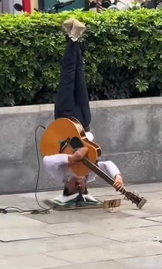 That literal upside down guitar.