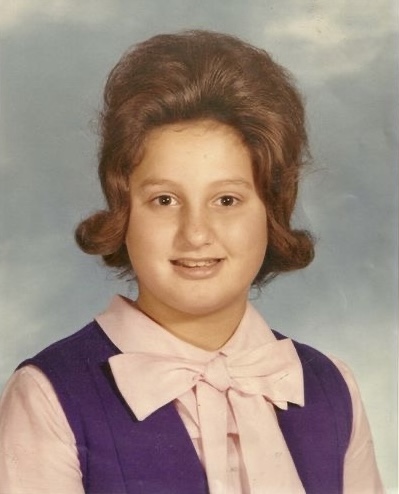 Why does this child look like she pays taxes?