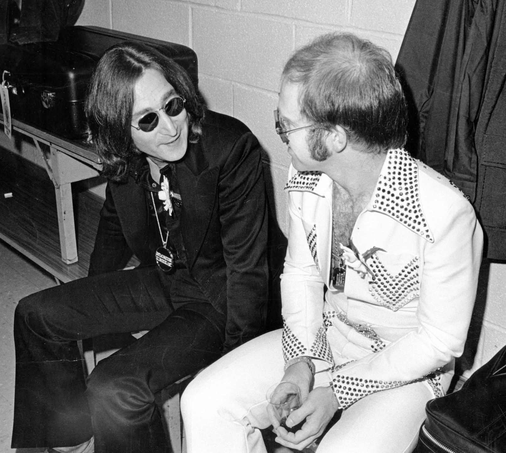 Two icons in deep conversation before the show.