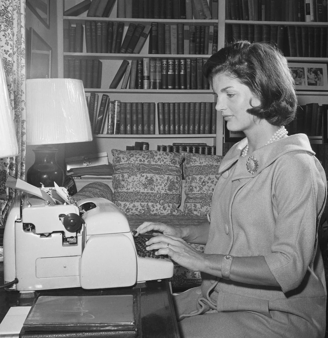 In the typewriter with her signature calm.